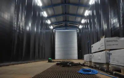 he enclosure of a surface treatment facility where blasting takes place.