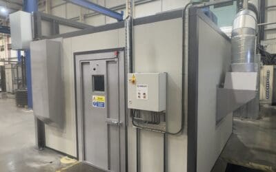 The rear of the blast Facility, with composite panels, ventilation ducting, and a control box in view.